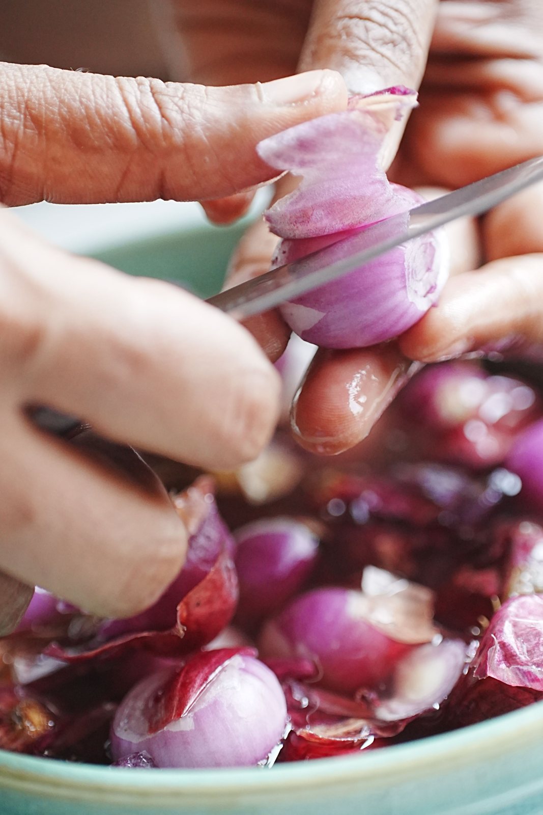 Small onions prepared for kitchen use